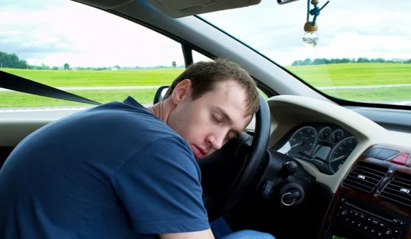 Man Sleep in Car